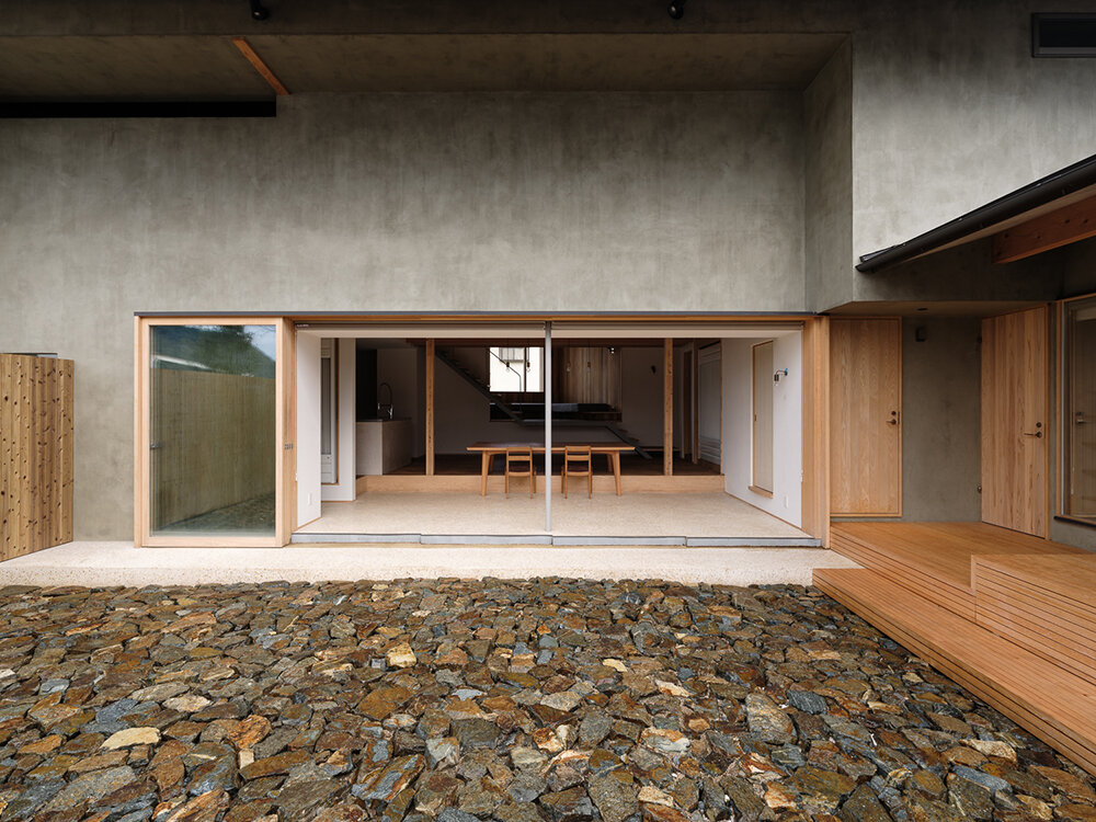 a viewing room playfully protrudes from tetra works' rental villa in hiroshima