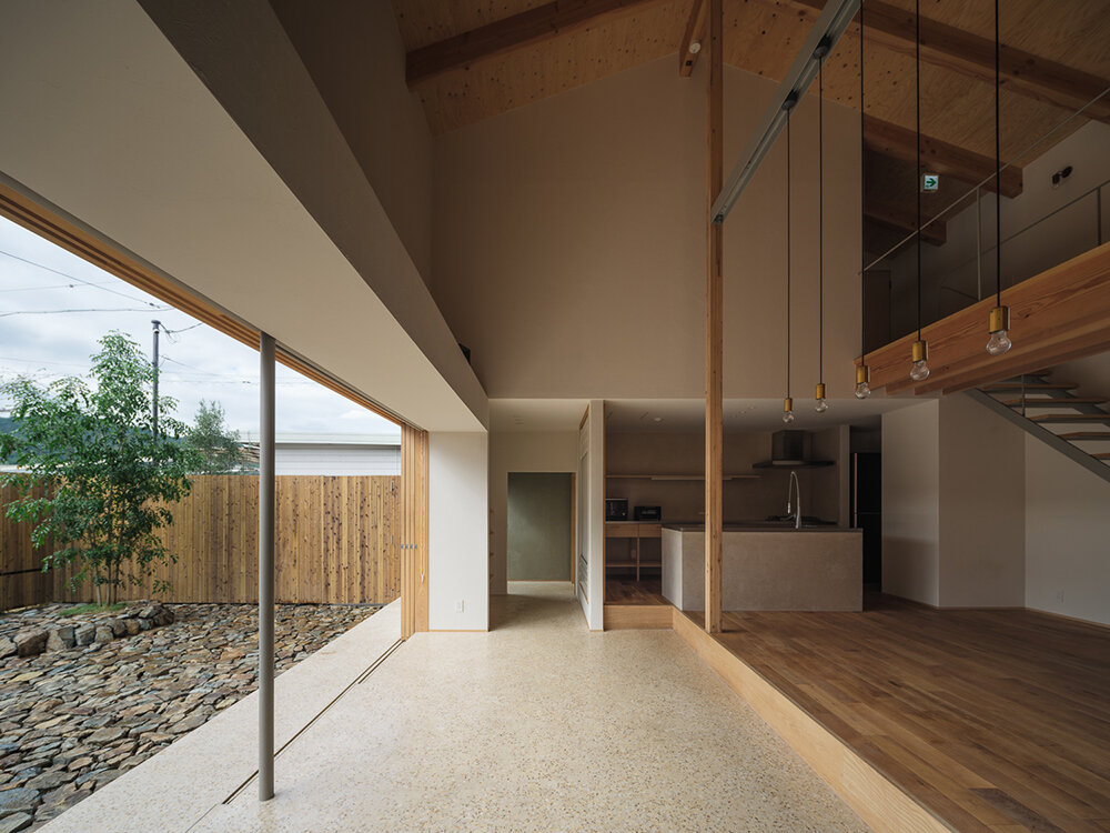 a viewing room playfully protrudes from tetra works' rental villa in hiroshima