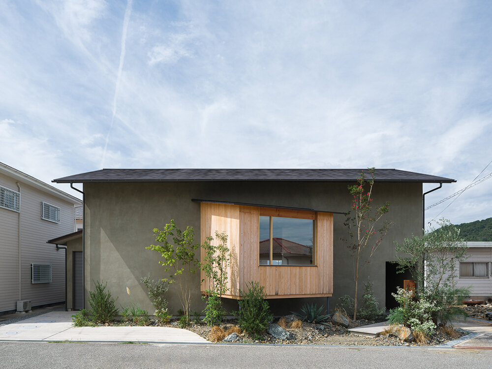 an observation room playfully protrudes from Tetra Works' rental villa in Hiroshima