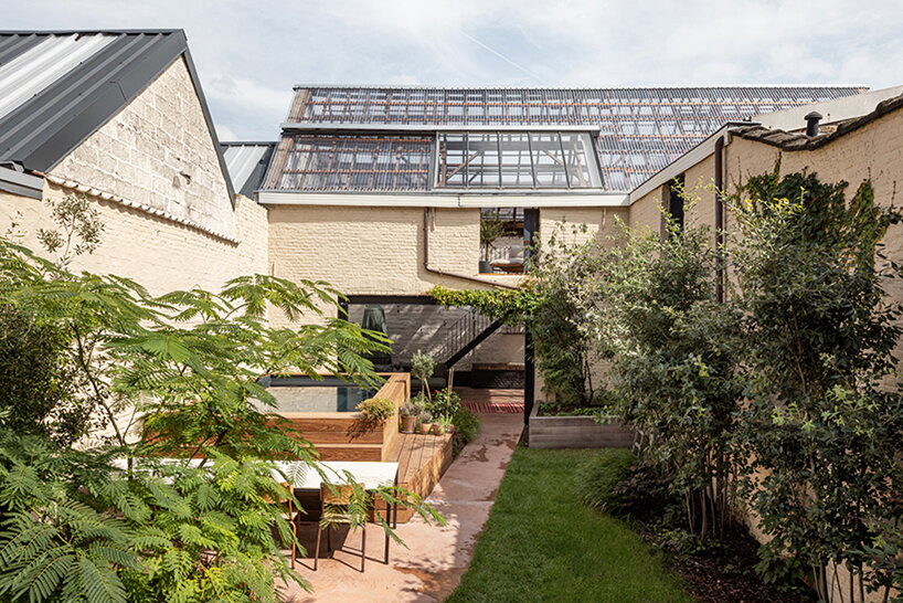 slaughterhouse café turns into sunlit multi-level residence by atelier vens vanbelle in belgium