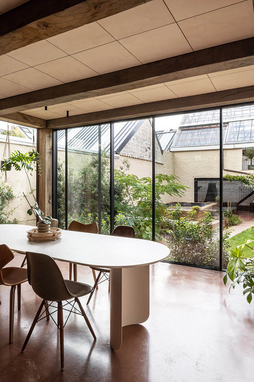 slaughterhouse café turns into sunlit multi-level residence by atelier vens vanbelle in belgium