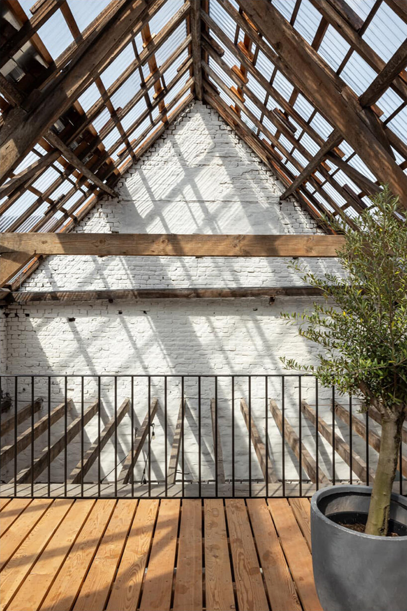 slaughterhouse café turns into sunlit multi-level residence by atelier vens vanbelle in belgium