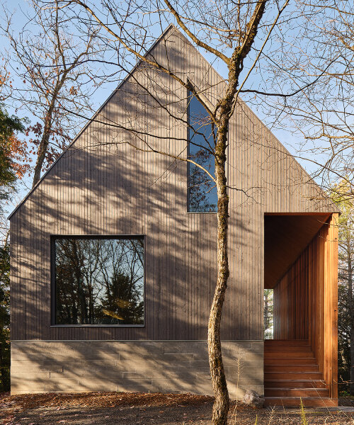 dubbeldam's rustic cottage in canadian woodlands unfolds within two intersecting gables