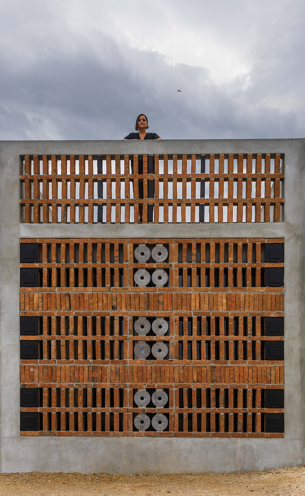 latticed stone motifs punctuate casa que da's folded concrete body in cerritos, mexico