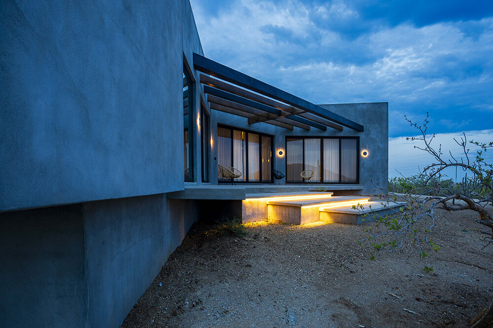 latticed stone motifs punctuate casa que da's folded concrete body in cerritos, mexico