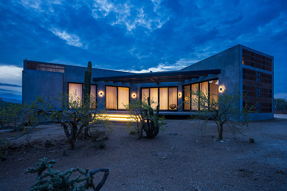 latticed stone motifs punctuate casa que da's folded concrete body in cerritos, mexico