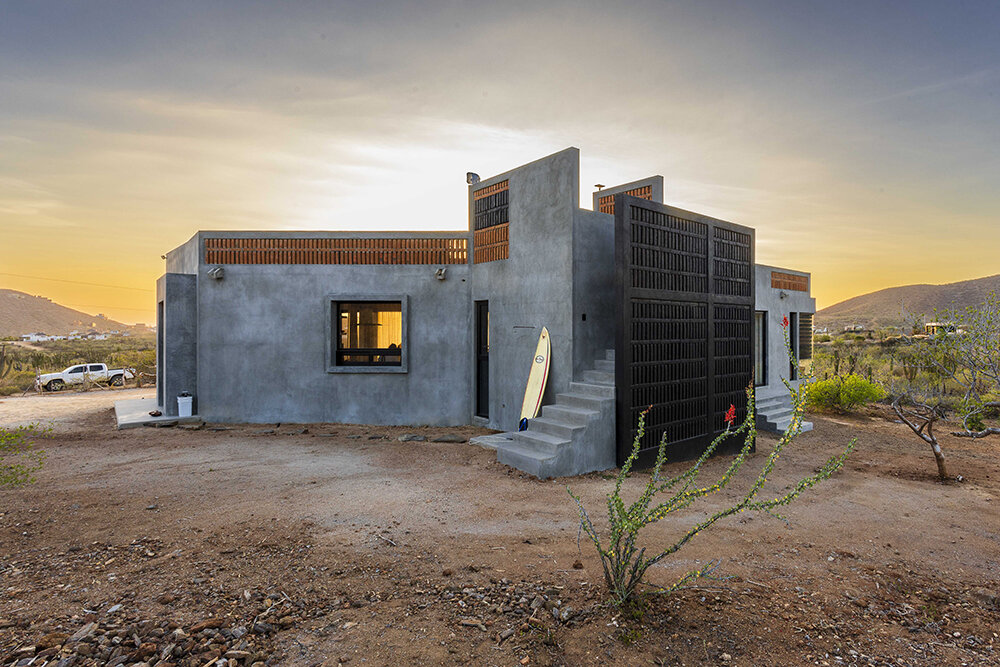 latticed stone motifs punctuate casa que da's folded concrete body in cerritos, mexico