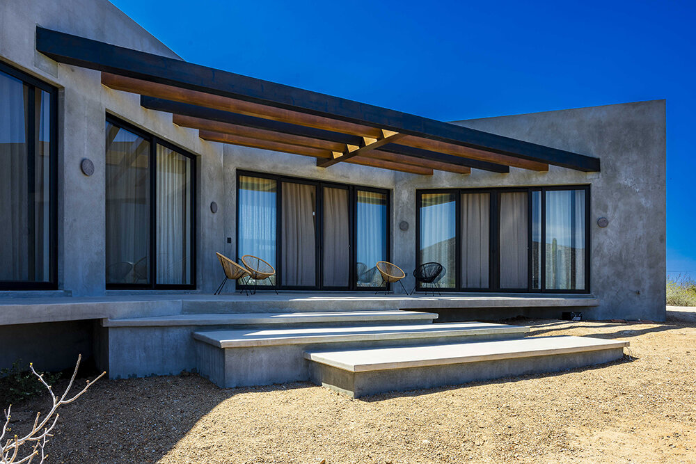 latticed stone motifs punctuate casa que da's folded concrete body in cerritos, mexico