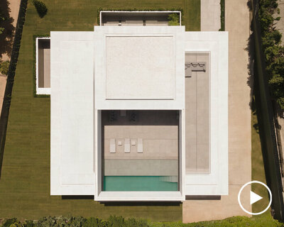 fran silvestre arquitectos' latest villa emerges around a compluvium-shaped core in madrid
