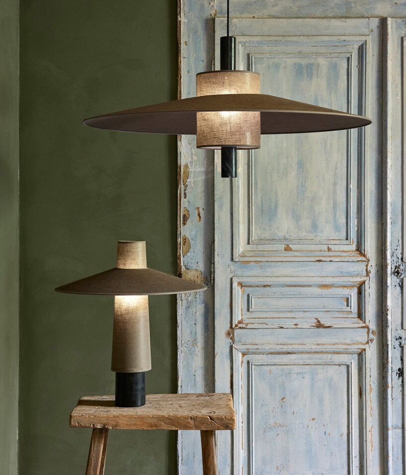 forestier's thésée collection infuses primitive design into handcrafted floating luminaires