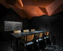 vermilion origami ceiling unfolds inside inrestudio's sushi restaurant in vietnam