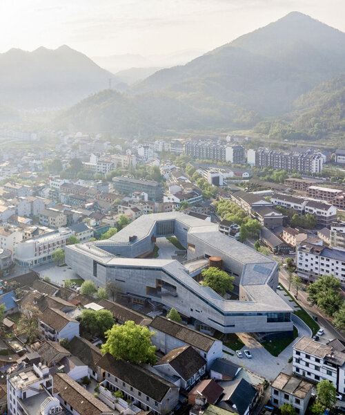 zhejiang lishui guyanhuaxiang art center by line+ spreads a fragmented ring formation
