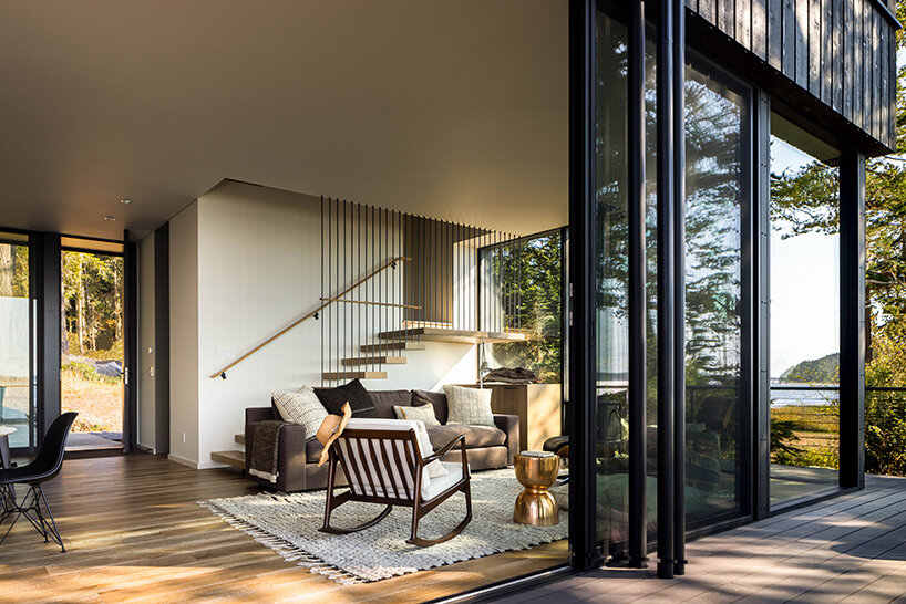 heliotrope architects' cabin lookout opens broadly onto lopez island's pacific shores