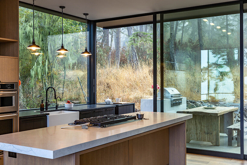 heliotrope architects' cabin lookout opens broadly onto lopez island's pacific shores