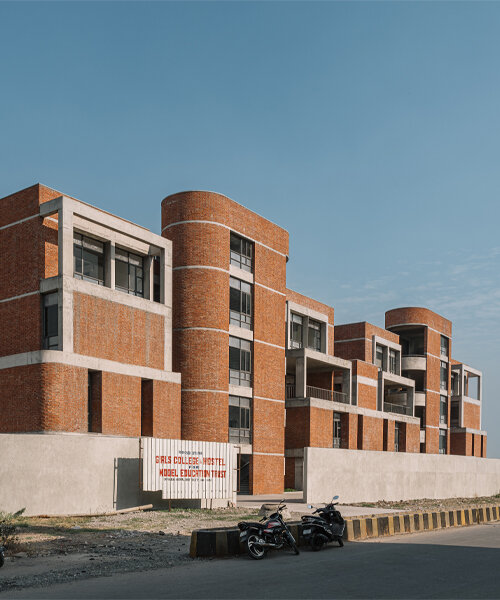rigid and curved brick volumes collide at girl’s nursing college & hostel in india