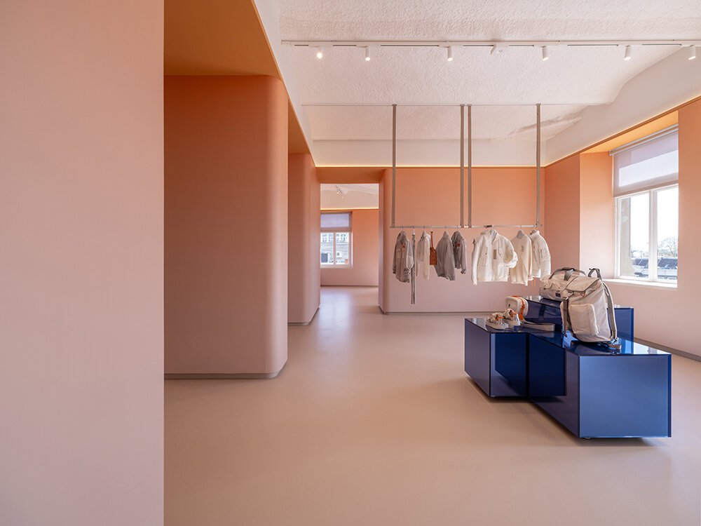 NIO house's amsterdam flagship by MVRDV culminates in an airy blue pavilion