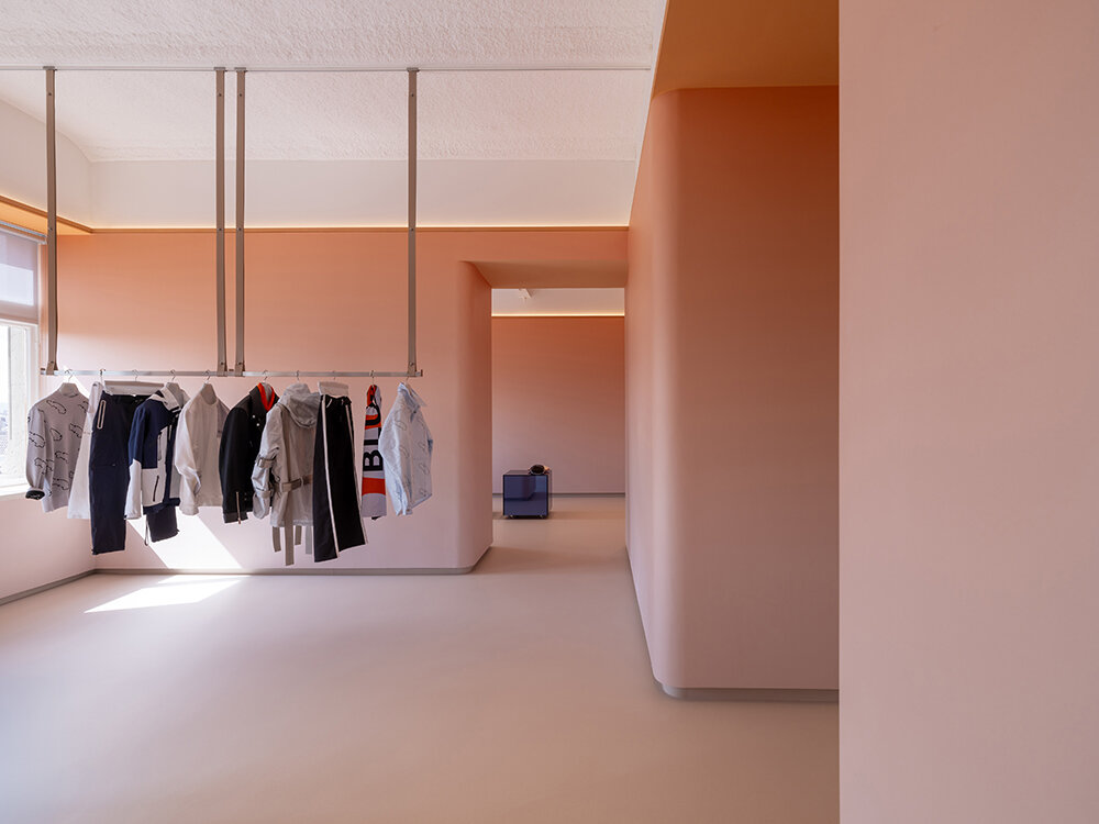 NIO house's amsterdam flagship by MVRDV culminates in an airy blue pavilion