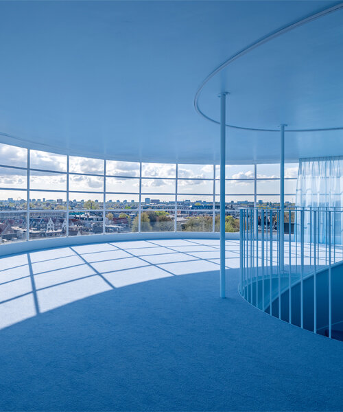 NIO house's amsterdam flagship by MVRDV culminates in an airy blue pavilion