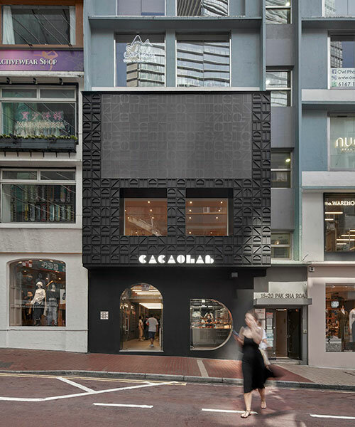 other projects' monogram facade conceals new-age cacaolab flagship store in hong kong