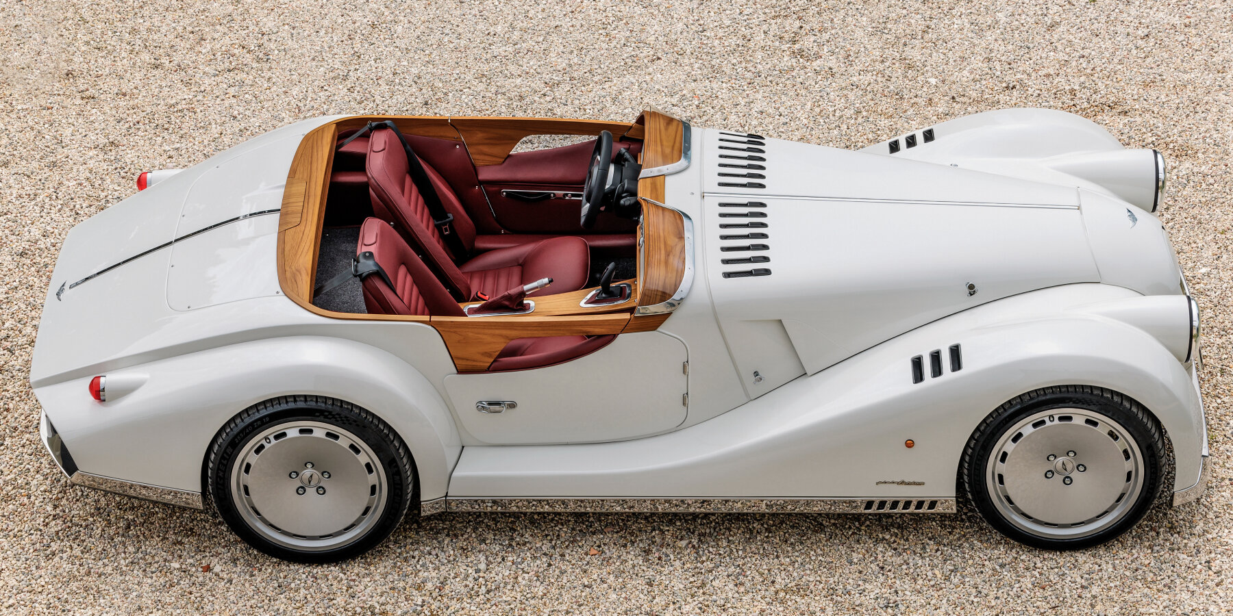 pininfarina-morgan-midsummer-coachbuild-wood-aluminum-designboom-ban