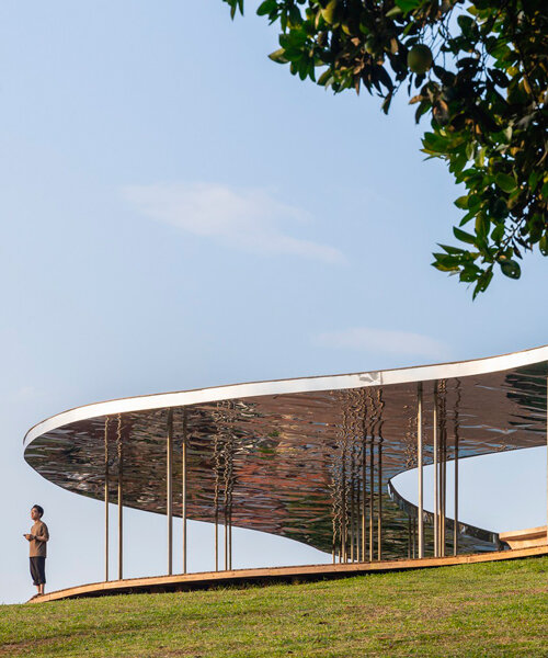 idee architects' quin pavilion hovers above vietnamese forest like a steel cloud