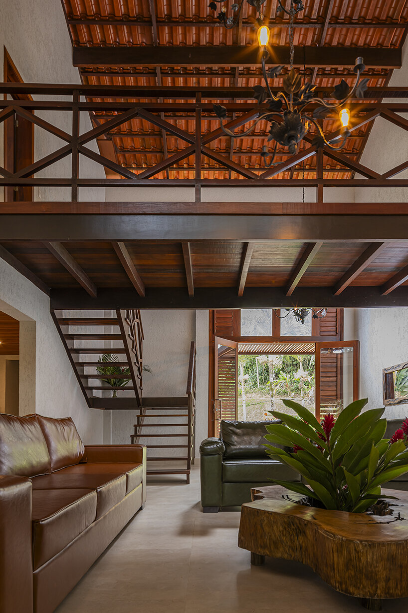 secluded casa sótão provides multi-level views to the lush brazilian landscape