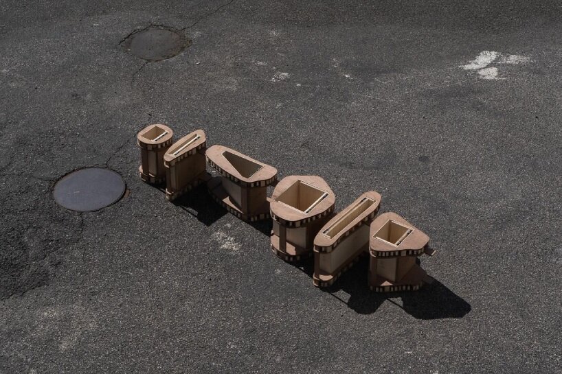 irregularly stacked volumes capture korean tradition of wish-making in this wood cabinet