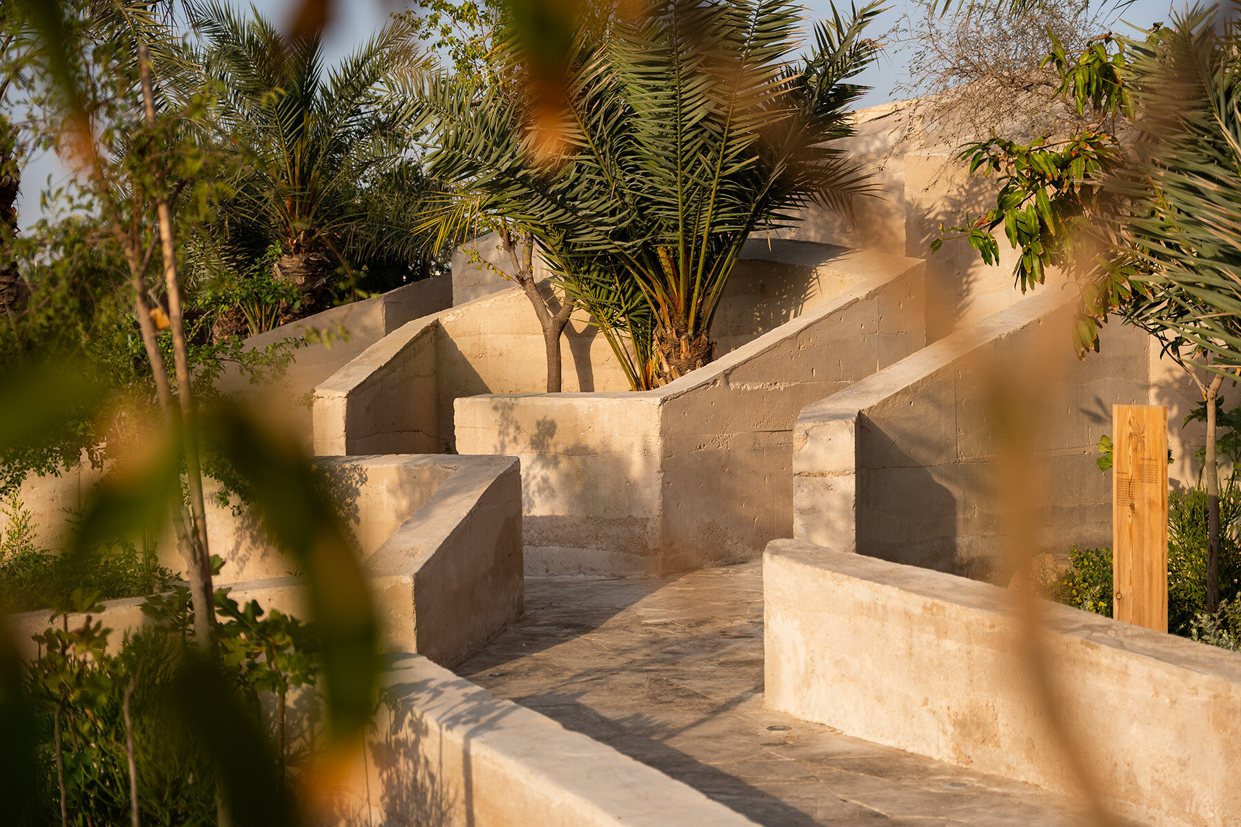 BIG sculpts rammed earth UAE pavilion at doha's international ...