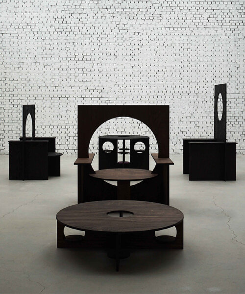 woocheol shin pierces dark wood furniture with circular openings for porthole series