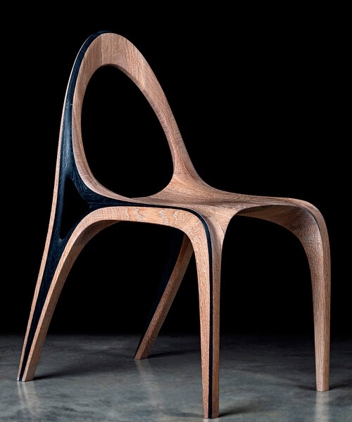 fluid convex and concave shapes take the form of wooden aria chair