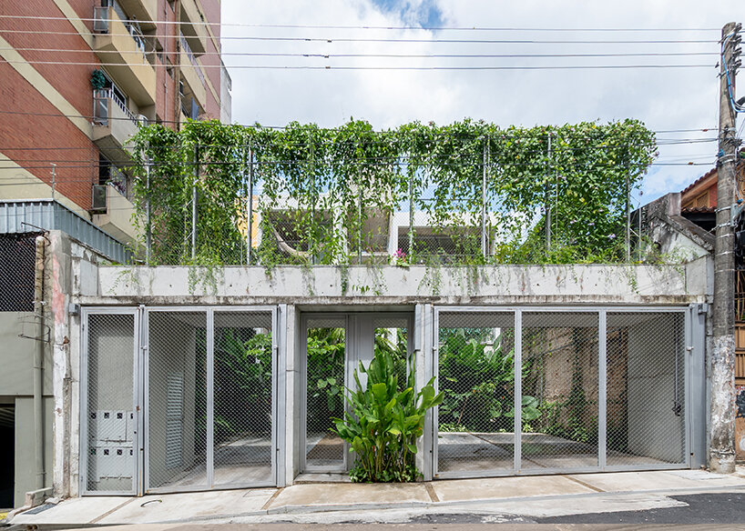 brazilian flora envelops community living project by laurent troost architectures