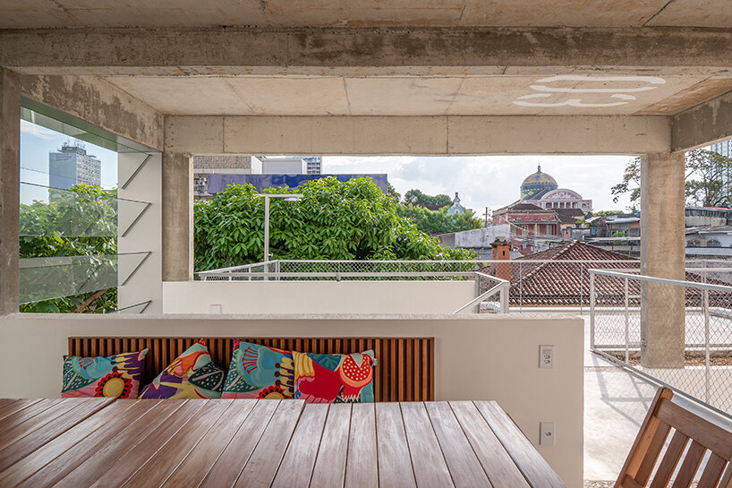 brazilian flora envelops community living project by laurent troost architectures