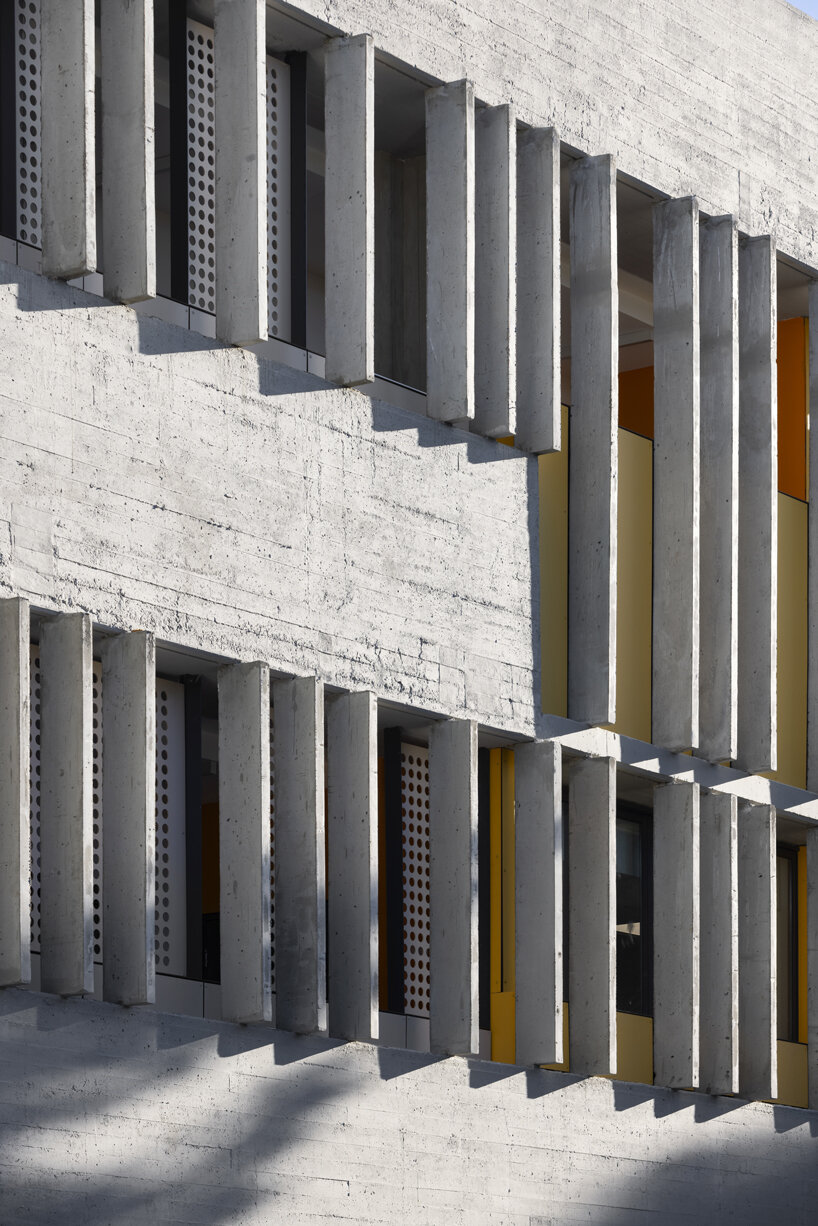 pops of color breathe new life into 1960s abandoned brutalist building ...