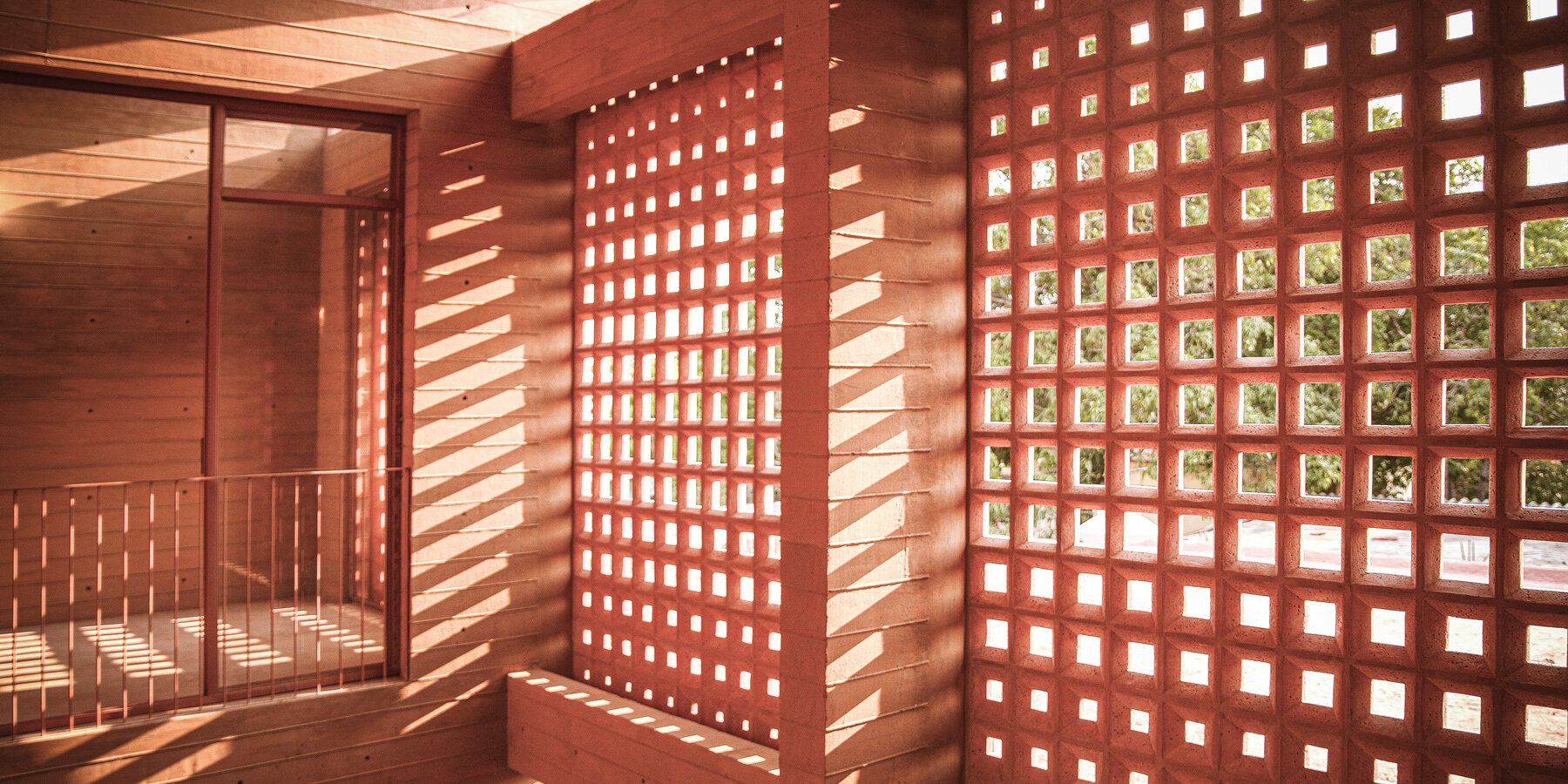 concrete-lattice-facade-oaxacan-community-hub-patterned-shadows-designboom-1800-03