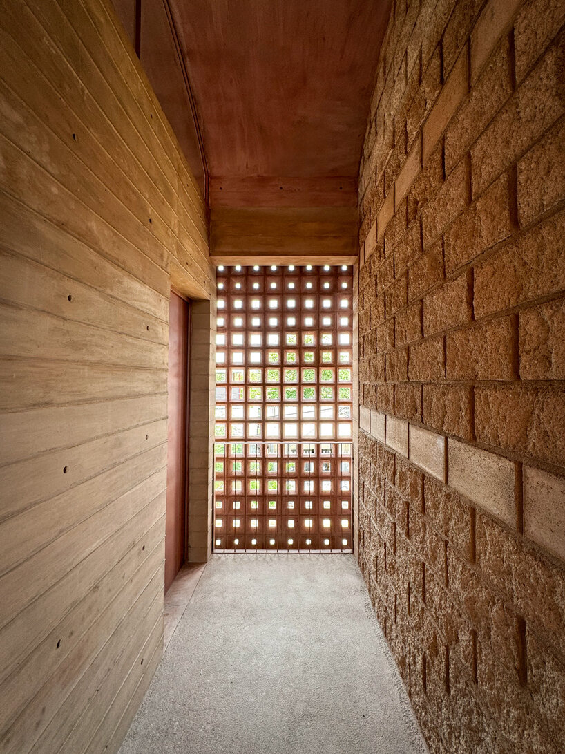 concrete lattice facade floods oaxacan community hub with patterned shadows