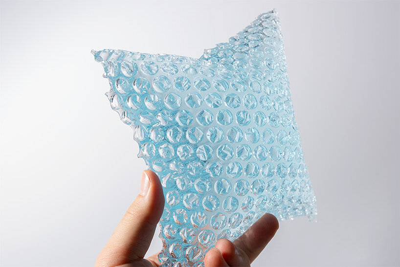 discarded plastic bags become molds for iceberg-shaped transparent objects by egosystem