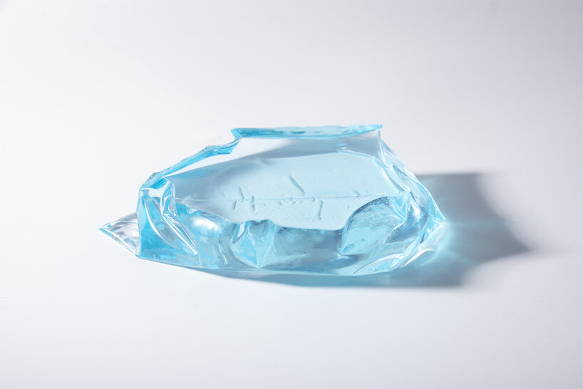 discarded plastic bags become molds for iceberg-shaped transparent objects by egosystem