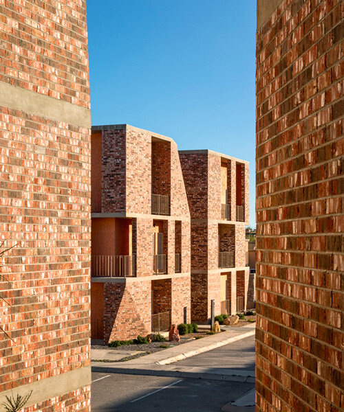 stepped brick-clad volumes and terraces outline DVS 03 residential complex in mexico