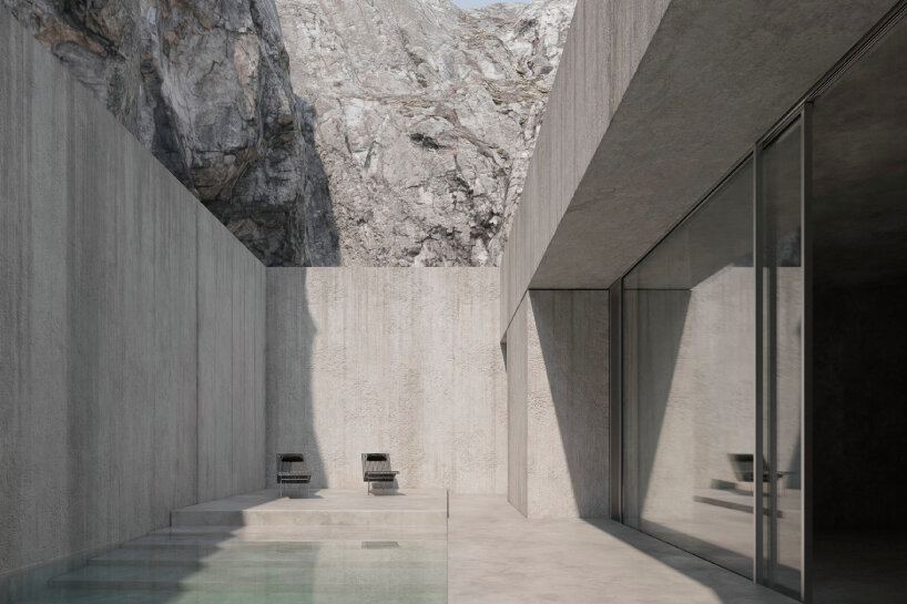 joão cepeda carves granite house into rugged cliffside in portugal