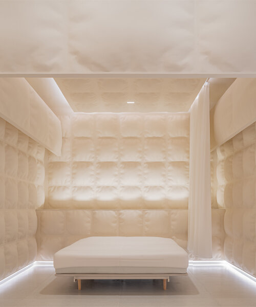 glass fiber-reinforced concrete 'pillows' clad this experience mattress store in shanghai