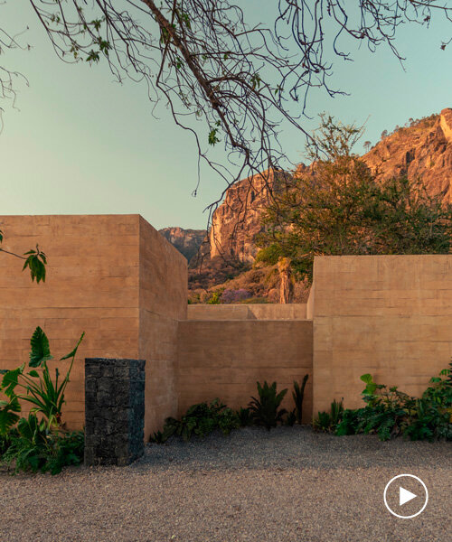 RA! sculpts monolithic house emerging from the rocky tepozteco cliffs in mexico