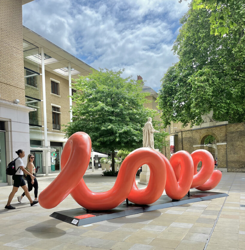 yoni alter's climbable sculpture in london reveals the word 'love'