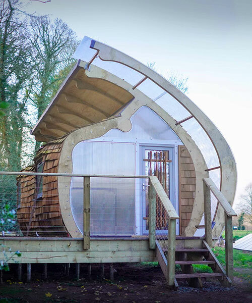 prefabricated cabin in UK woodland resembles timber monocoque structure aircraft