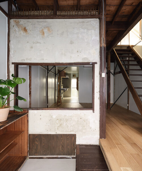 ROOVICE and cabbage truck restore centennial row house's structural frame in tokyo
