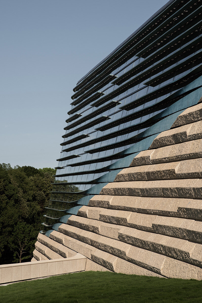 undulating facade simulates eyes of chinese relics in sanxingdui museum renovation