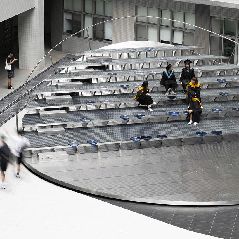 Silicon wafer-inspired memorial features raised stainless steel amphitheater in Taiwan