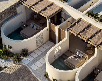 urban soul project's hotel sculpts traditional myconean forms in marble, timber, and stone