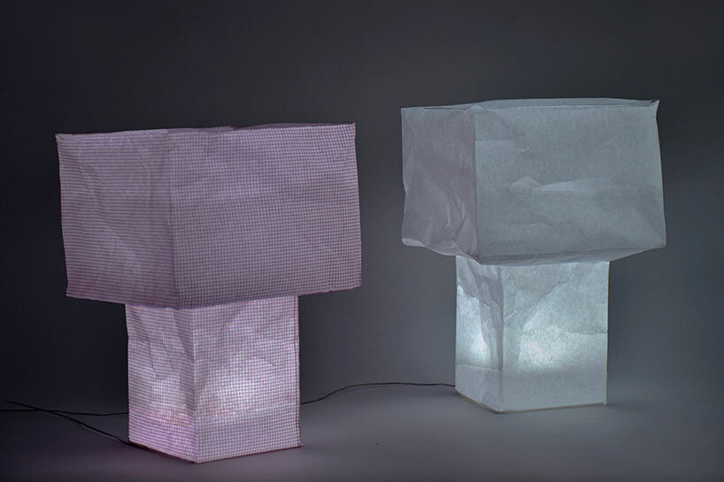 paquetes planos sellados al vacío se convierten en linternas de papel tsubomi por kazuhiro yamanaka