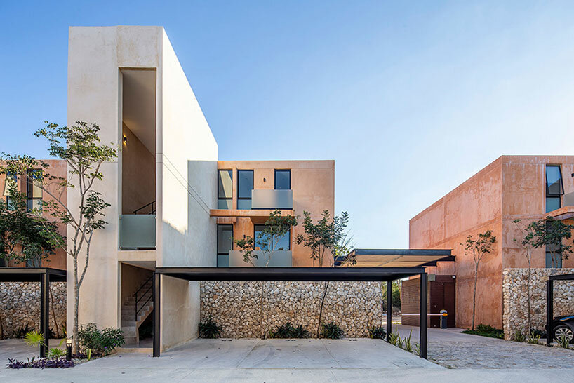 chukum, stone, and rhythmic openings shape mexican housing complex by P11 arquitectos
