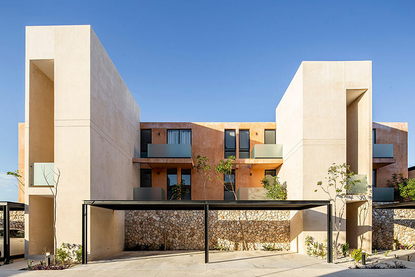 chukum, stone, and rhythmic openings shape mexican housing complex by P11 arquitectos